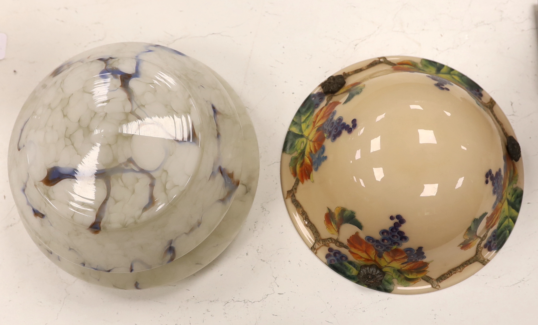 Two vintage glass plaffoniers comprising a French painted example and a marbleised example, 30cm diameter